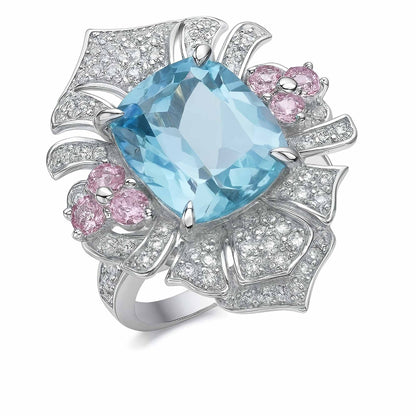 Blossom Sky: Blue Topaz and Pink Flower Ring in 925 Sterling Silver - Sound of Flowers
