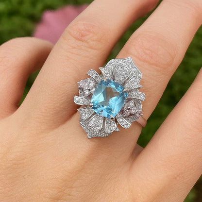 Blossom Sky: Blue Topaz and Pink Flower Ring in 925 Sterling Silver - Sound of Flowers